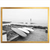 a black and white photo of two surfboards