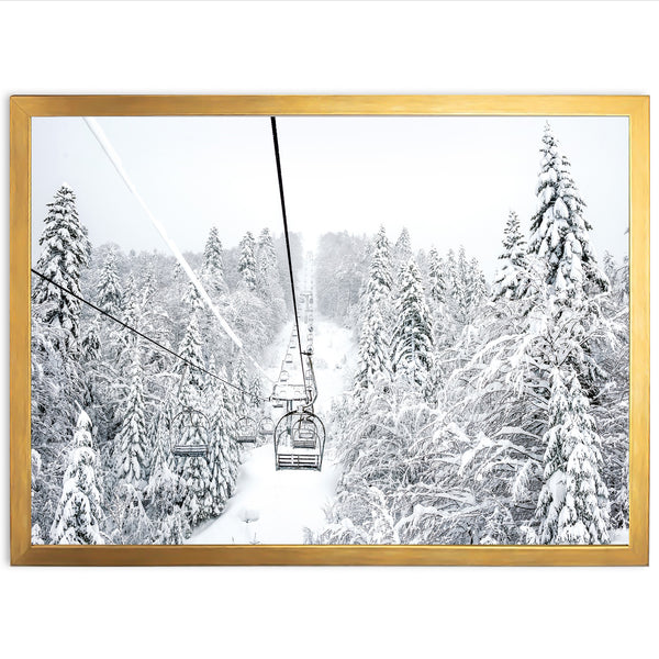 a picture of a ski lift in a snowy forest