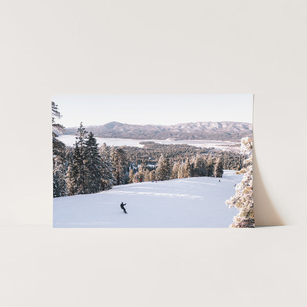 a picture of a person skiing down a hill