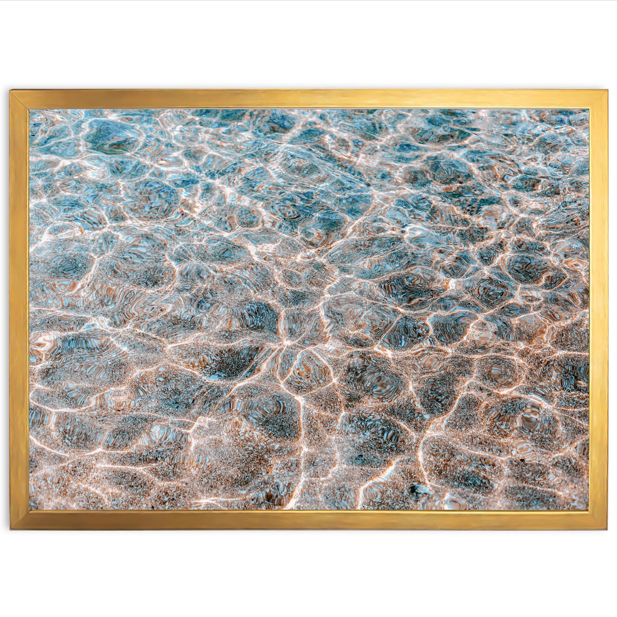 a picture of water in a gold frame