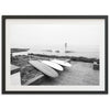 a black and white photo of two surfboards