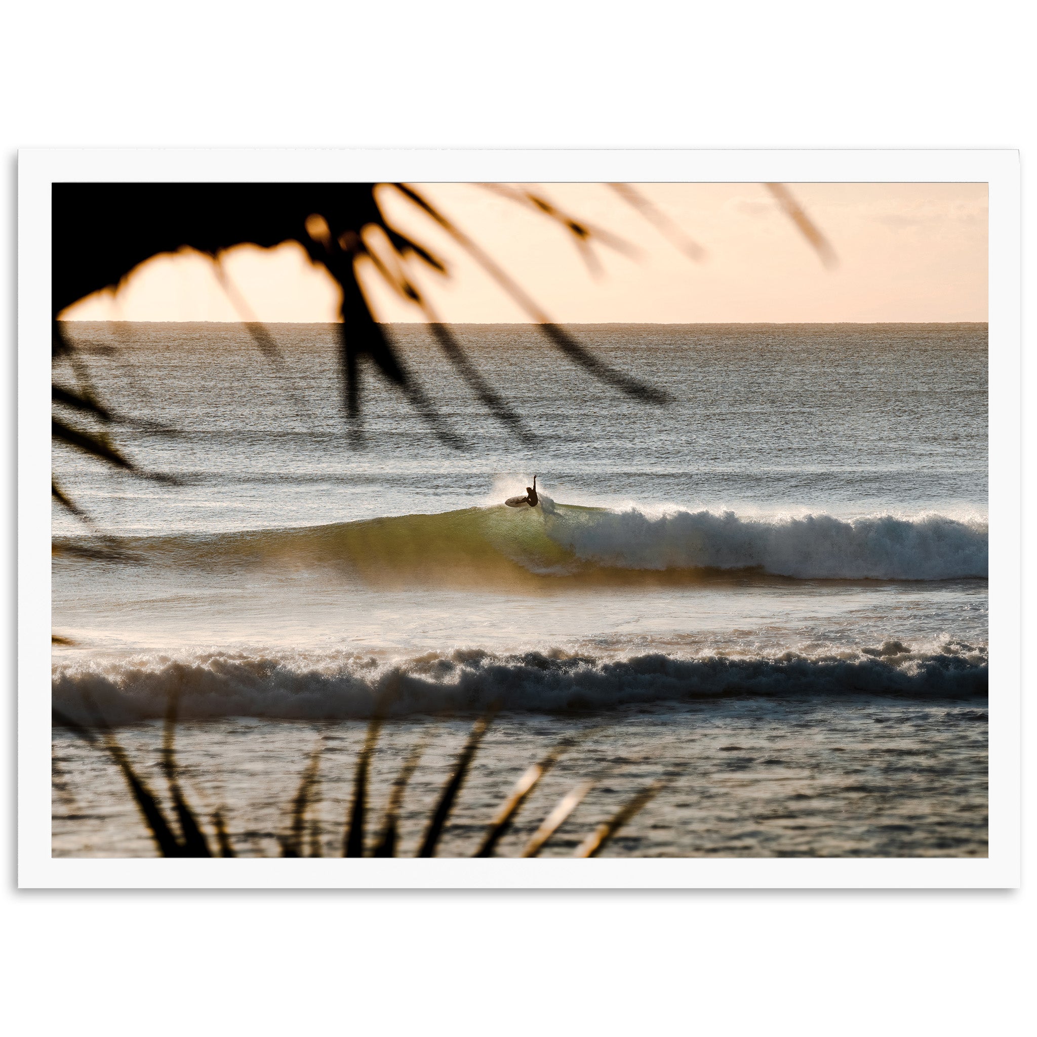 a person riding a wave on top of a surfboard