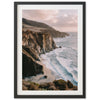 a picture of a beach with a cliff in the background