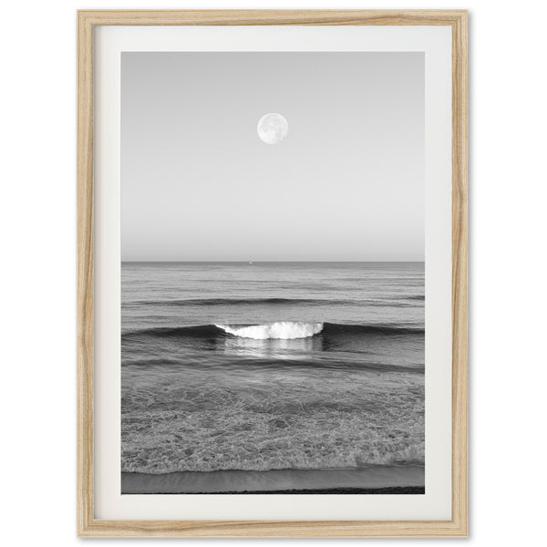 a black and white photo of a wave in the ocean