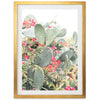 a picture of a cactus with red flowers