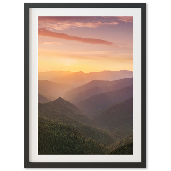 a picture of a sunset over a mountain range