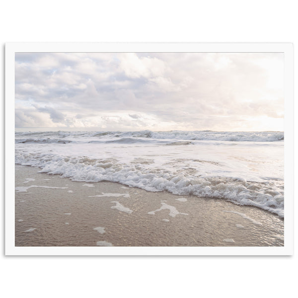 a picture of a beach with waves coming in