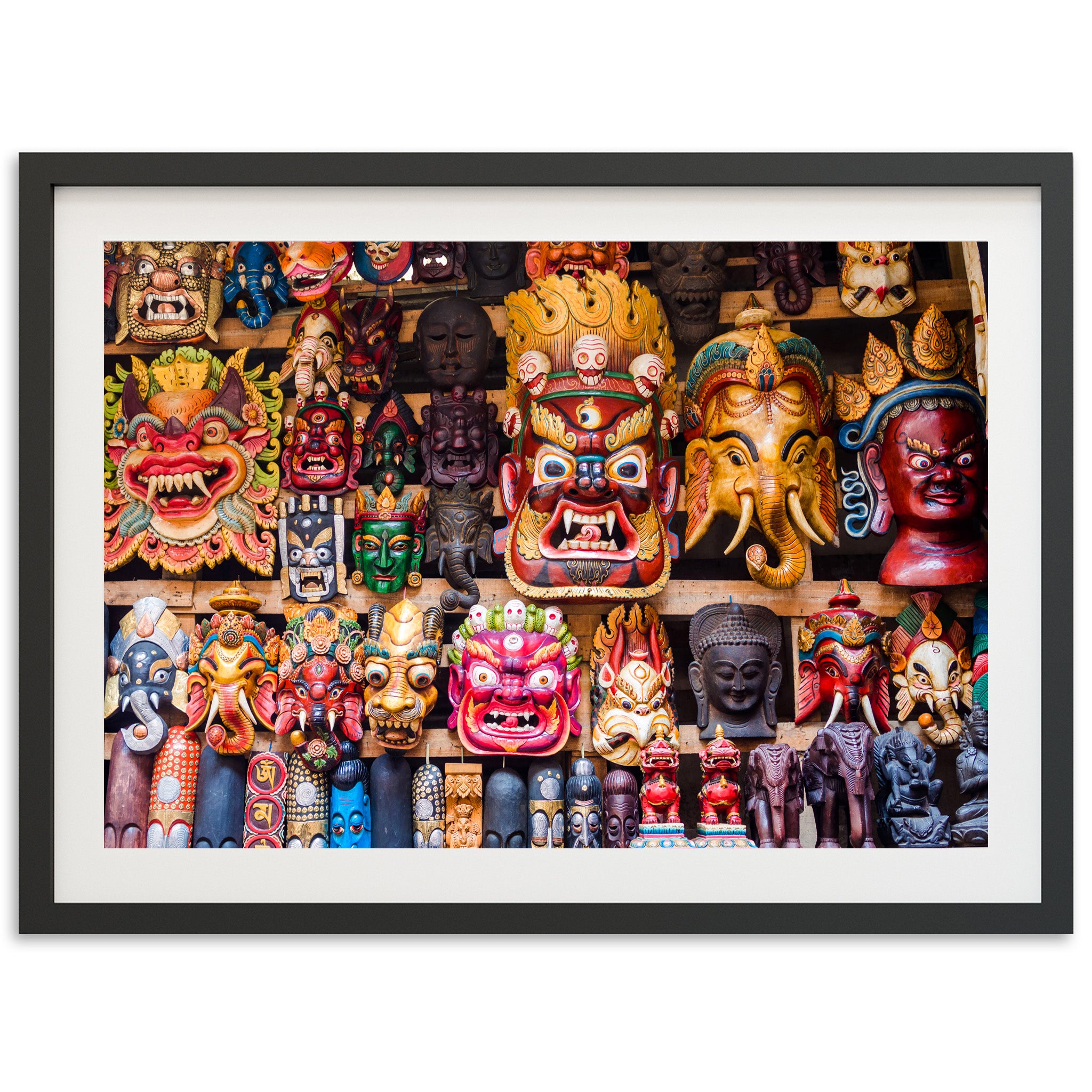 a group of masks are on display in a black frame