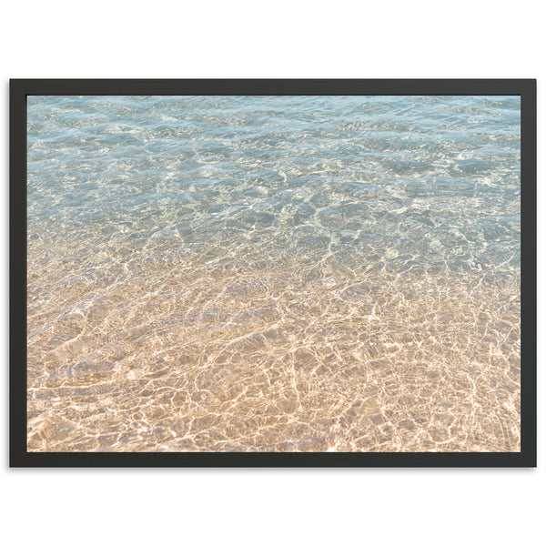 a picture of a beach with water and sand