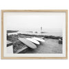 a black and white photo of two surfboards