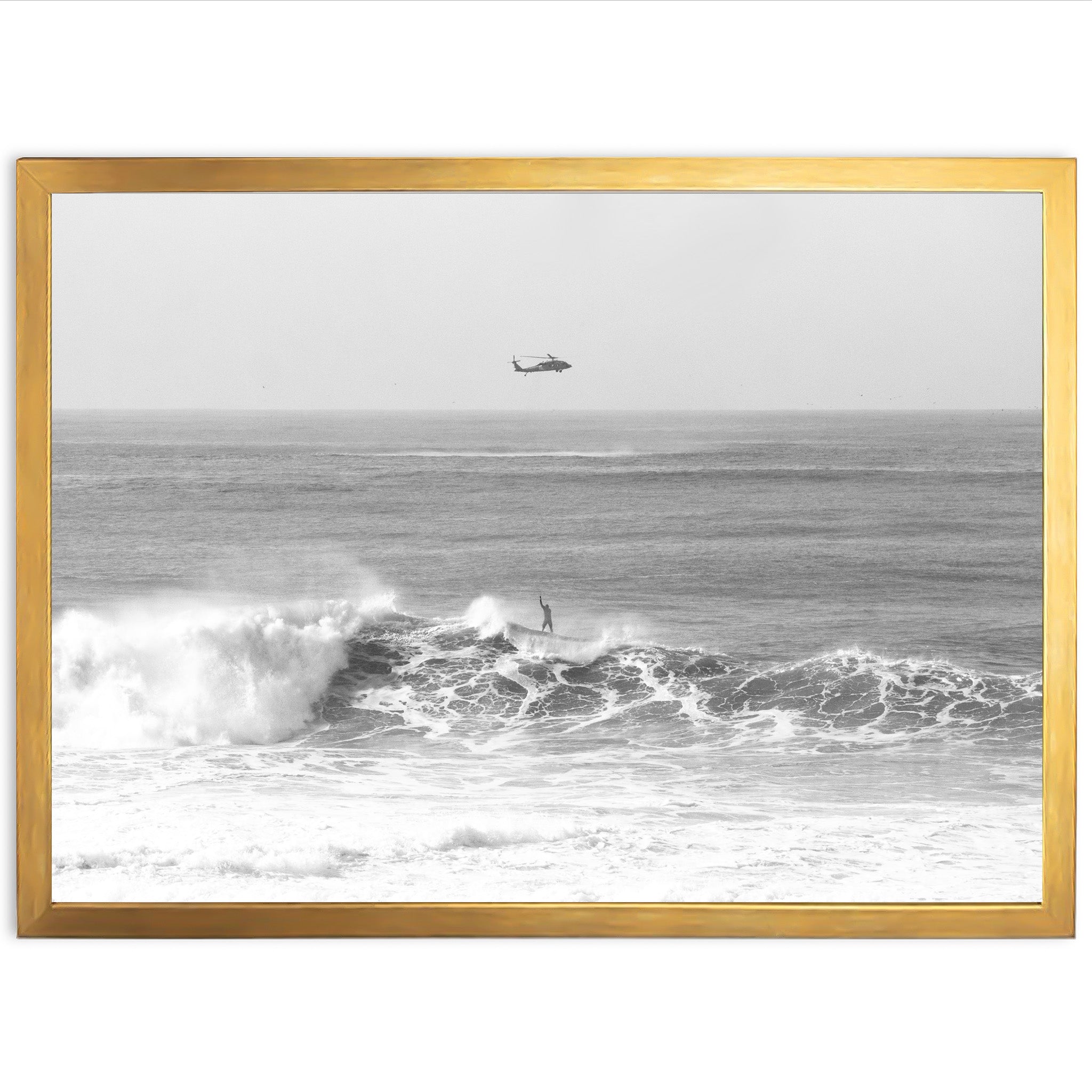 a black and white photo of a boat in the ocean