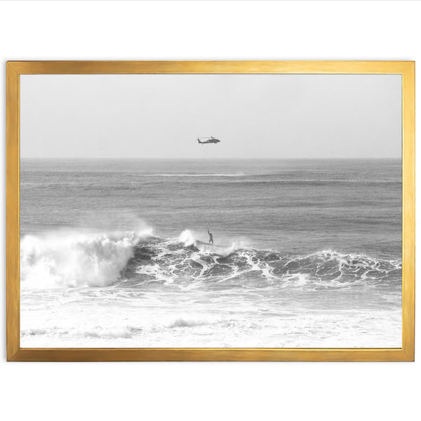 a black and white photo of a boat in the ocean