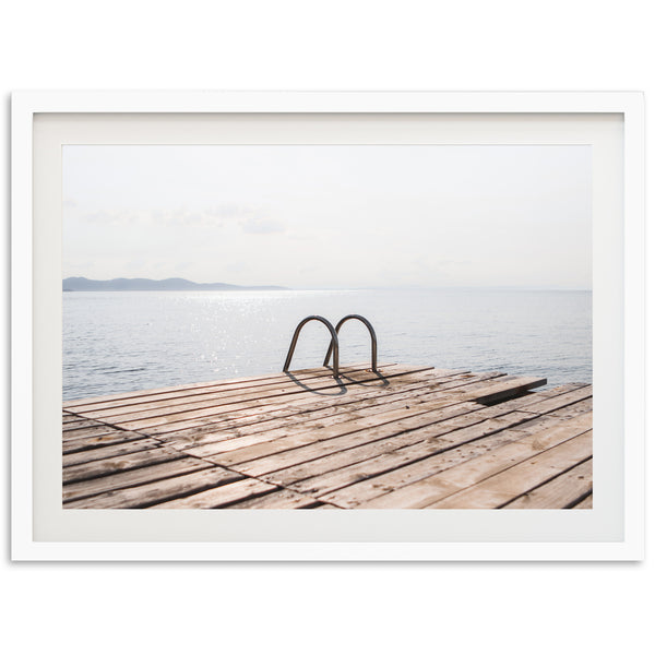 a picture of a pair of shoes on a dock