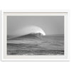 a black and white photo of a wave in the ocean