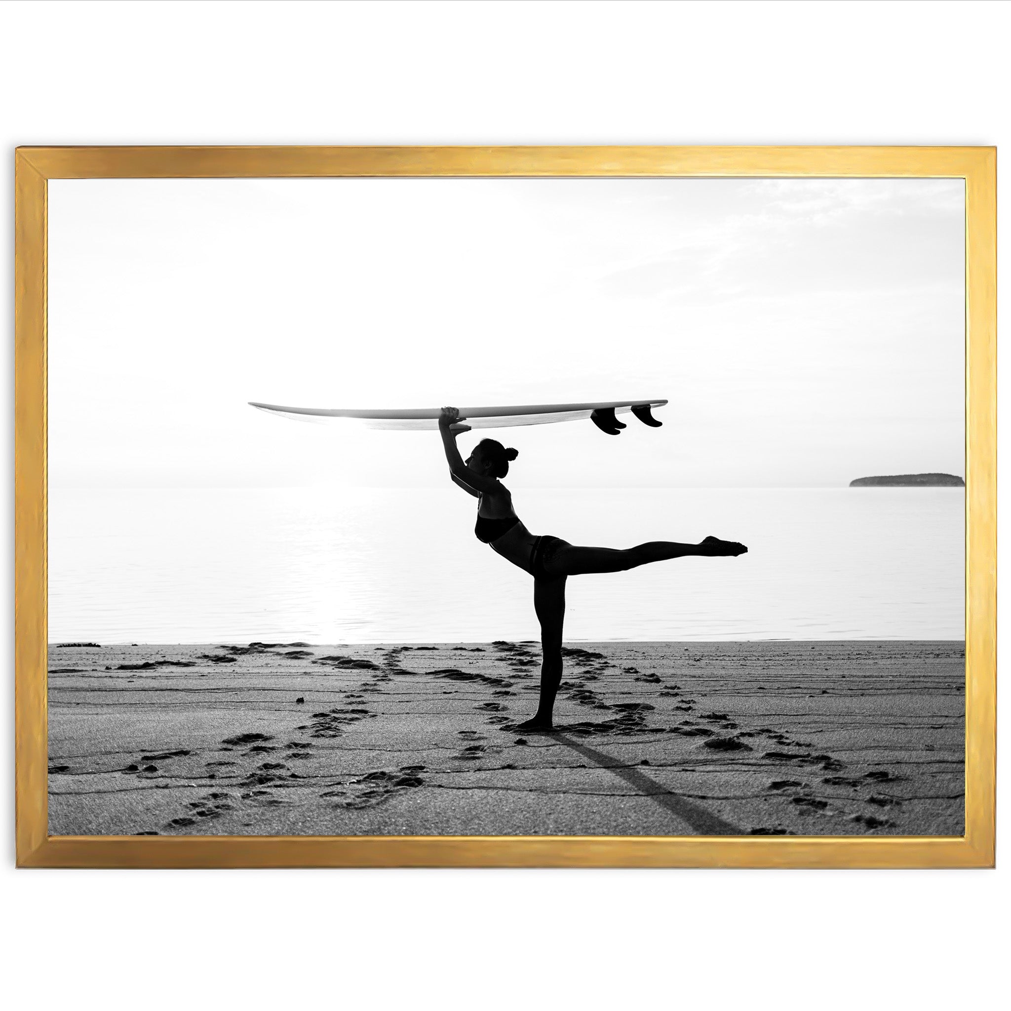 a man holding a surfboard over his head on a beach