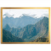 a picture of a mountain range with a golden frame