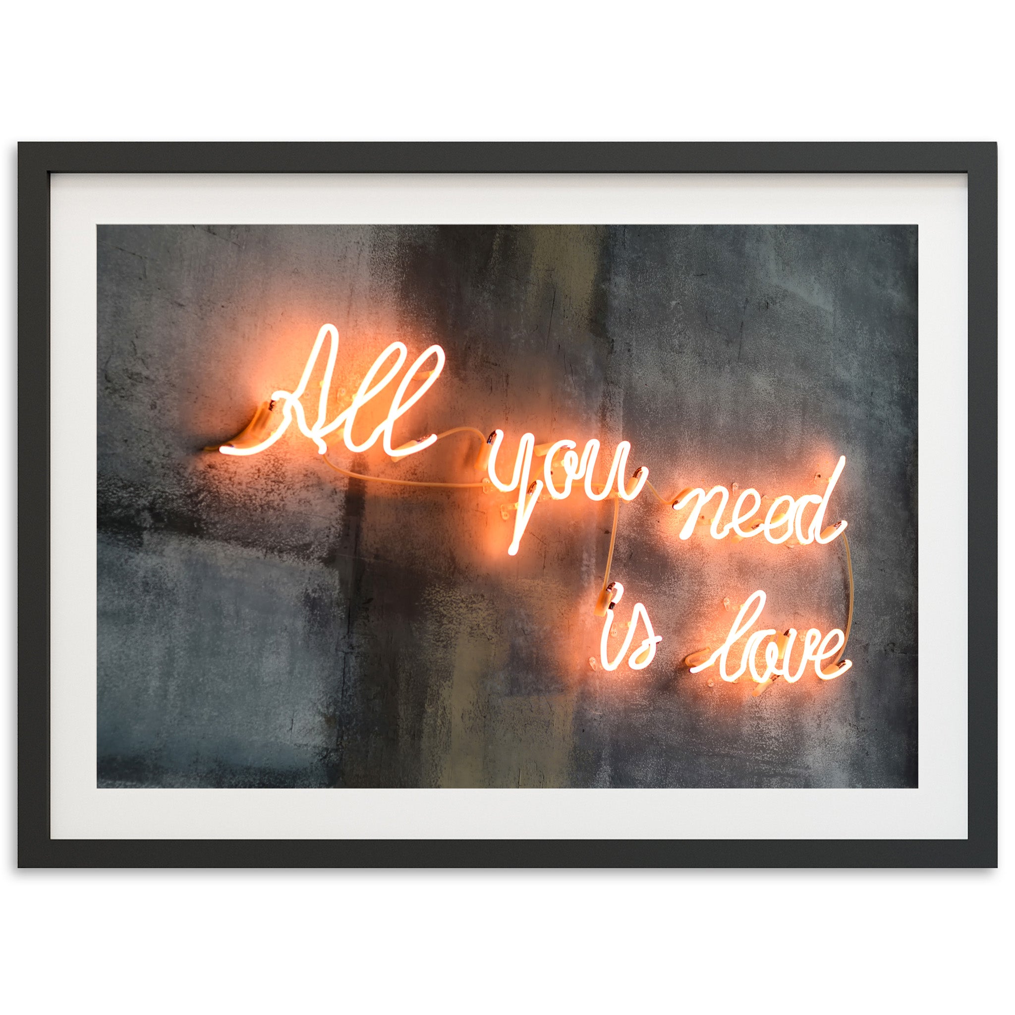 a neon sign that says all you need is love