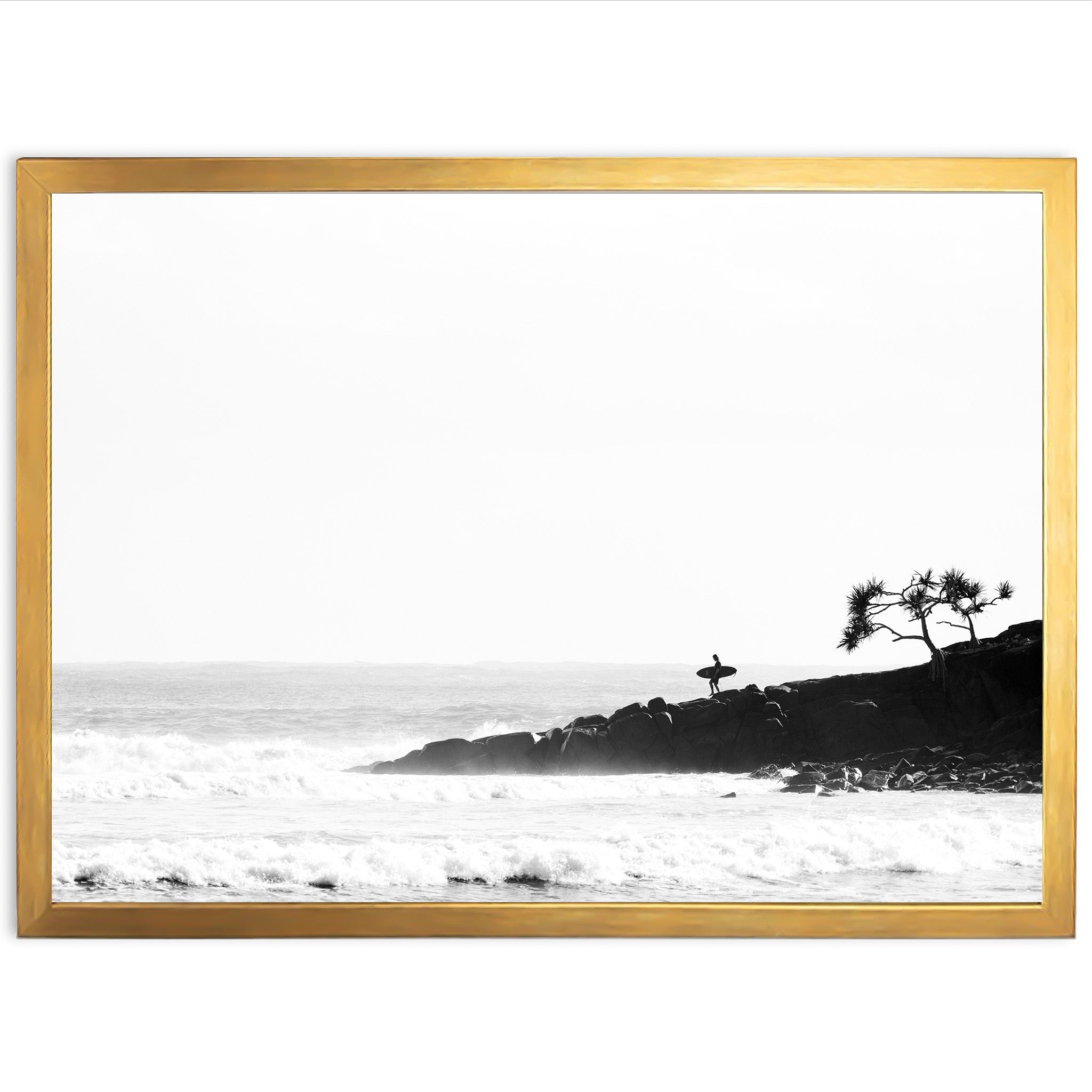 a black and white photo of a beach