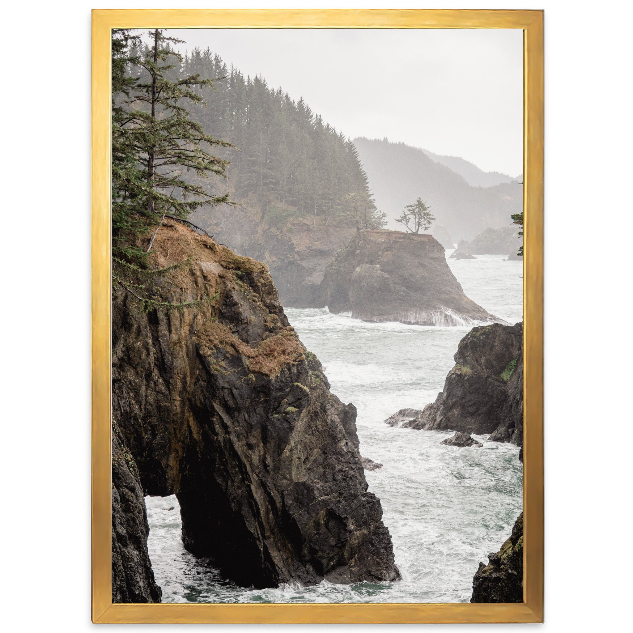 a picture frame with a picture of a rocky coastline