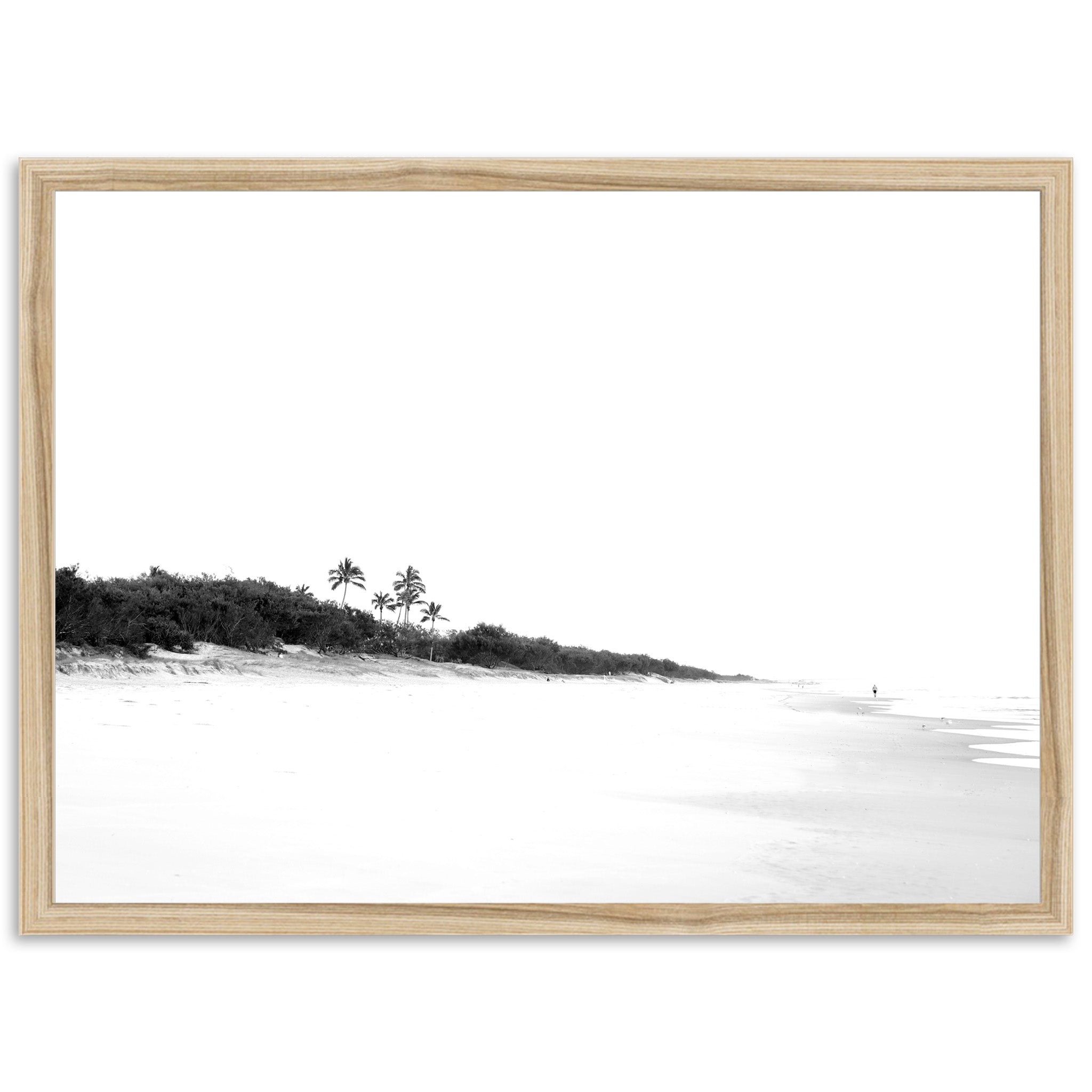 a black and white photo of a beach