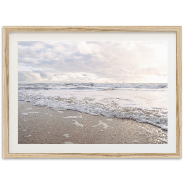 a picture of a beach with waves coming in