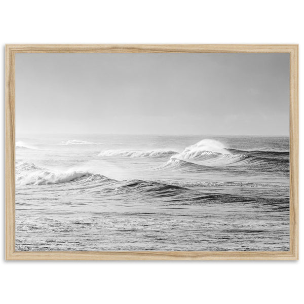 a black and white photo of waves in the ocean