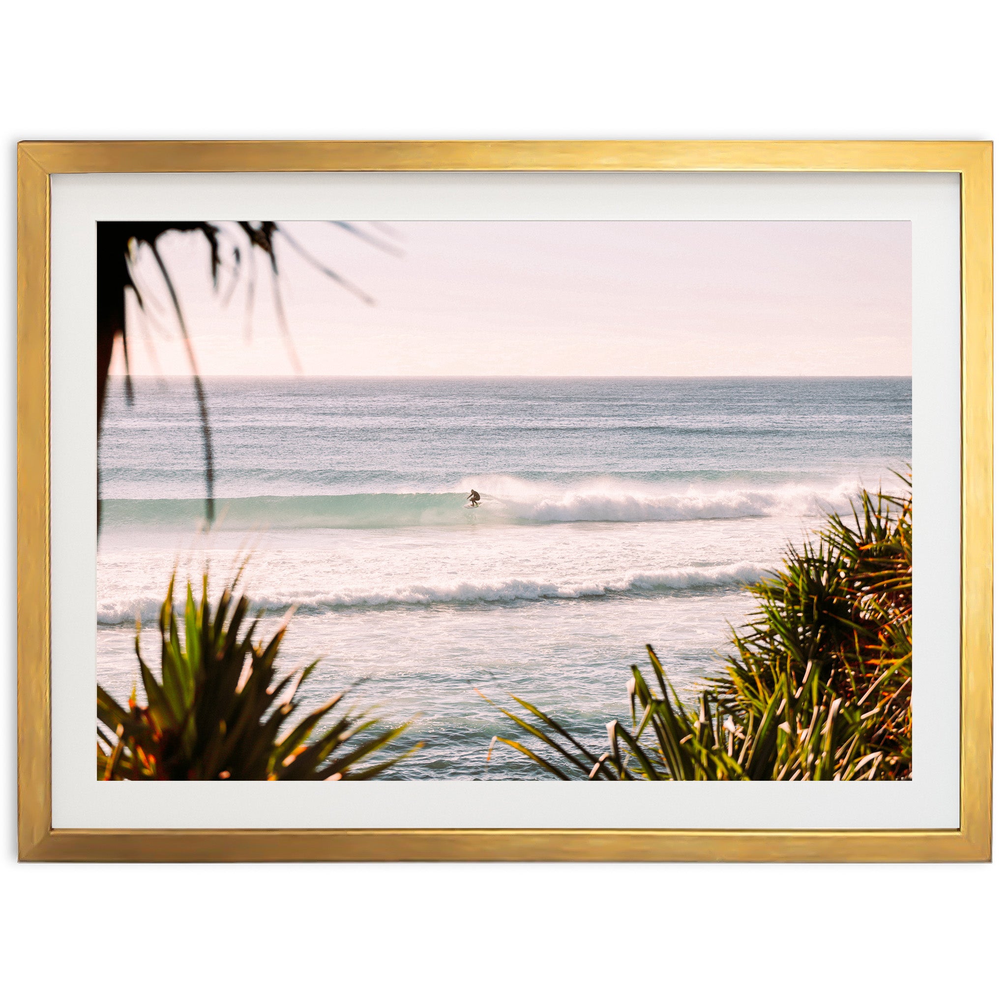 a picture of a surfer riding a wave in the ocean