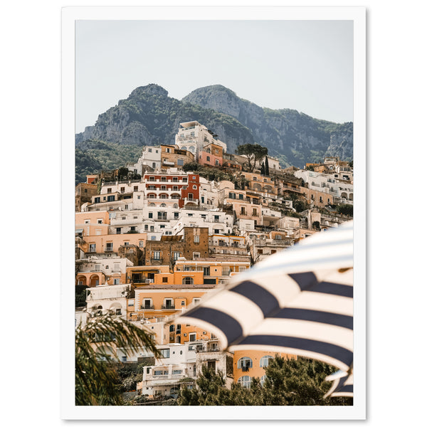 a picture of a city with mountains in the background