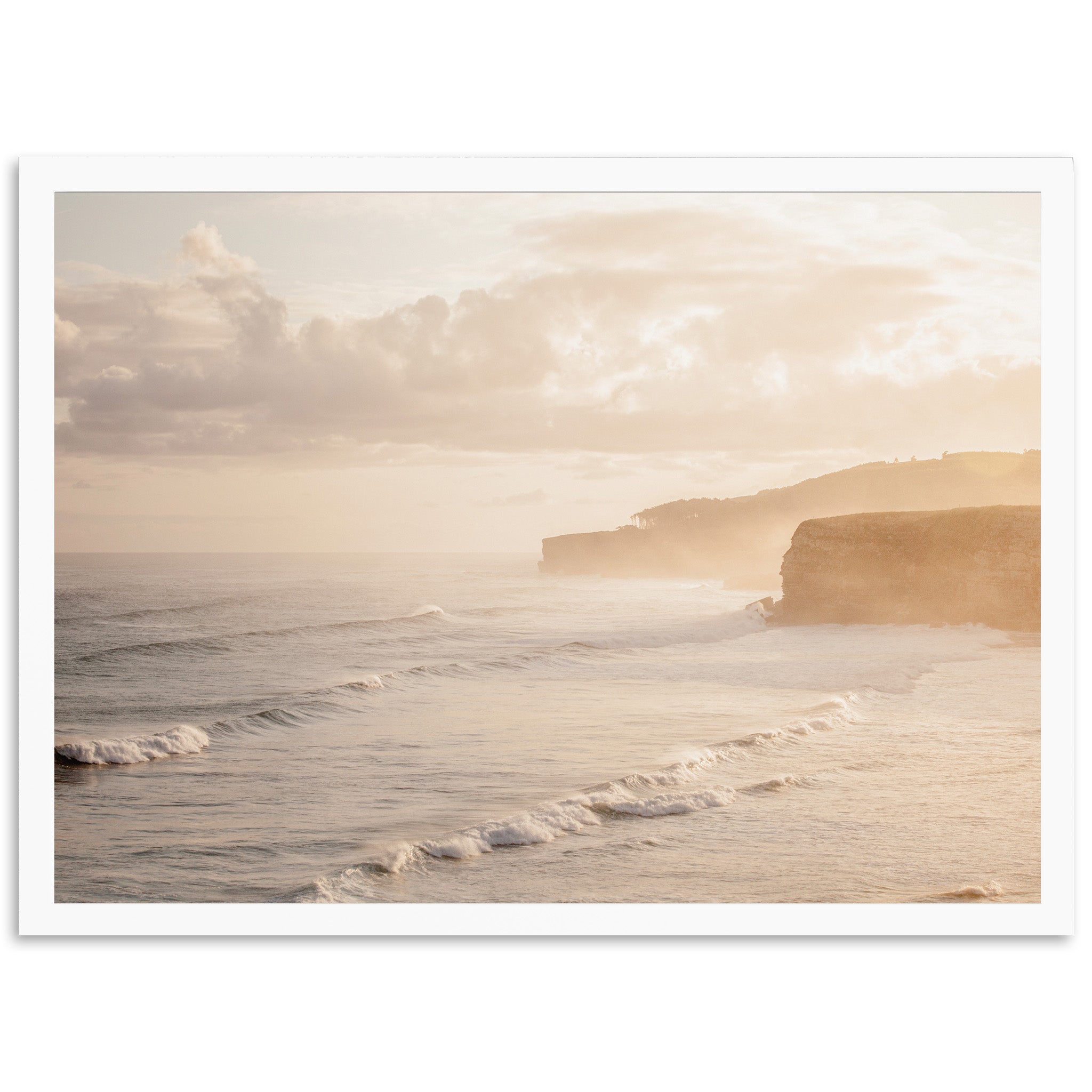 a picture of a beach with waves coming in