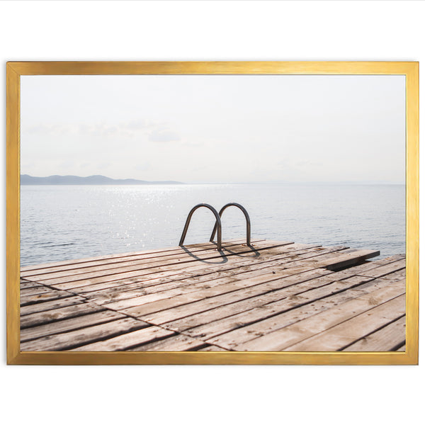 a wooden dock with a pair of shoes on it