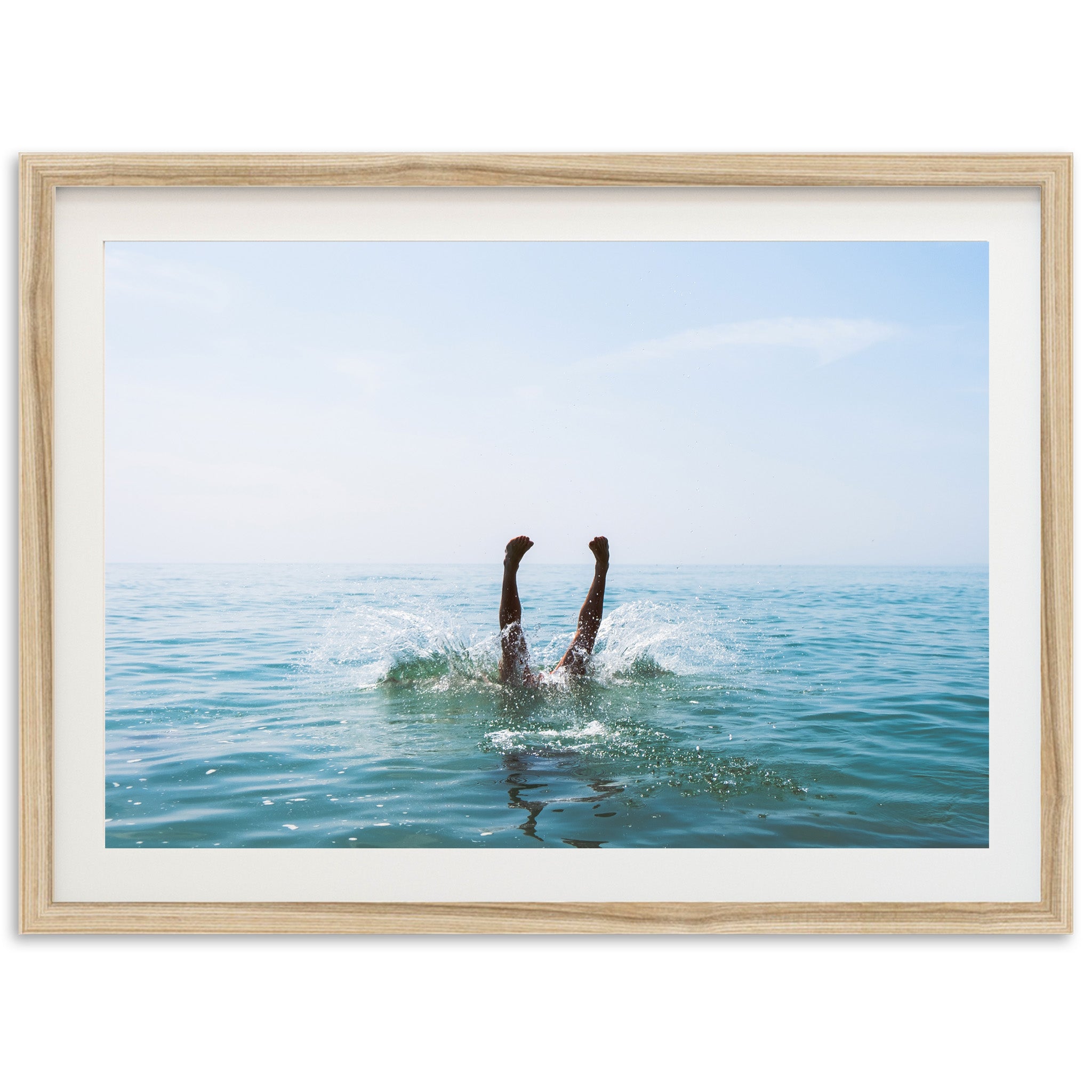 a picture of a person swimming in the ocean