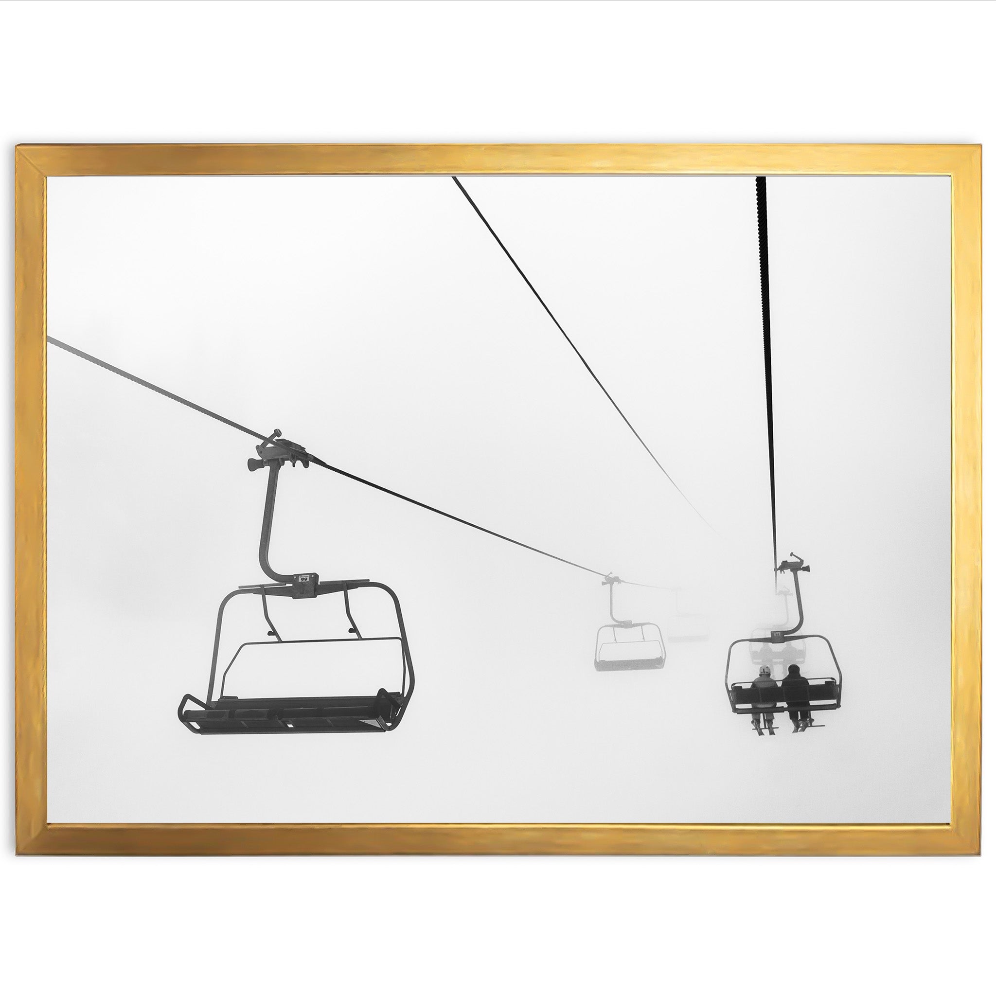 a black and white photo of a ski lift