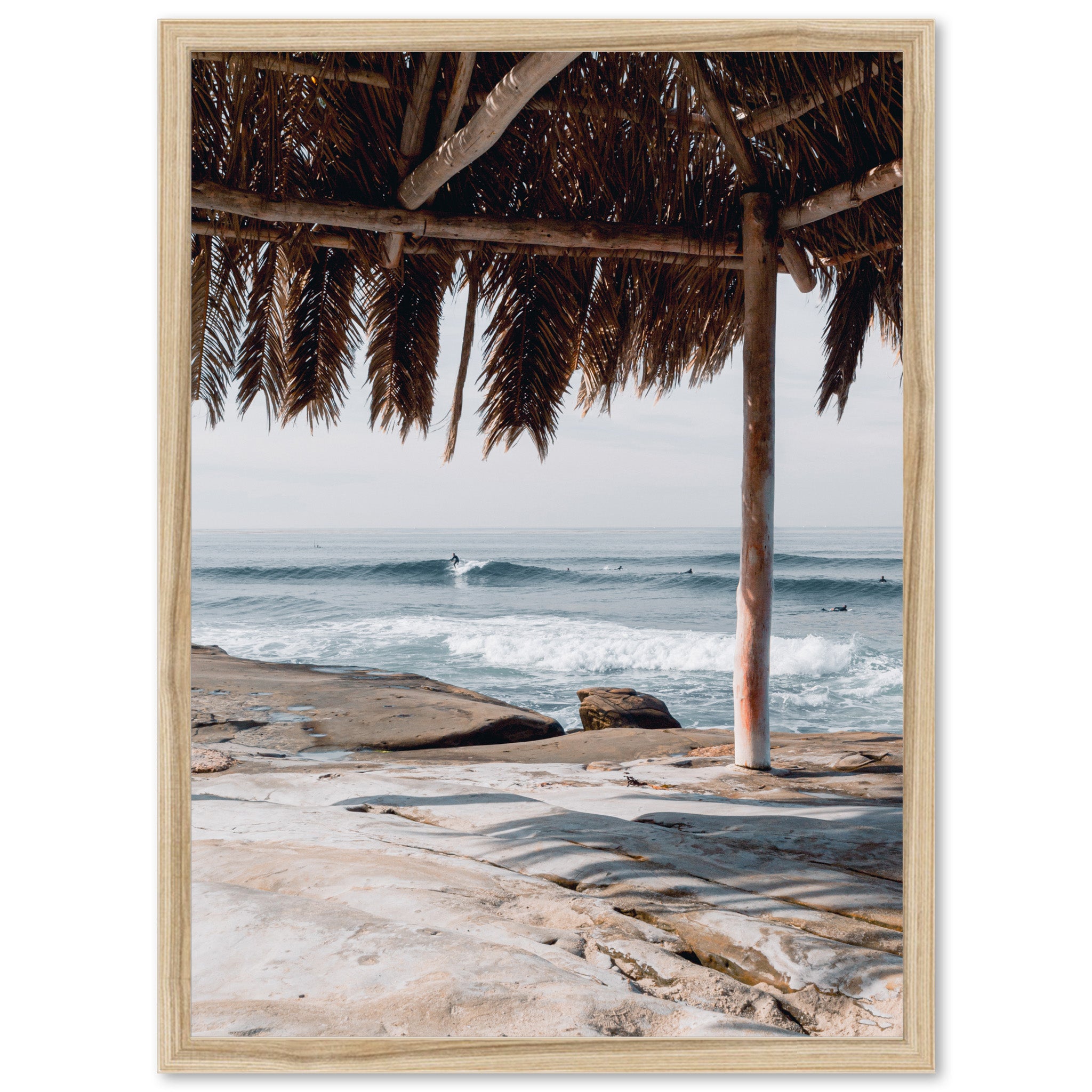 a view of the ocean from under a hut