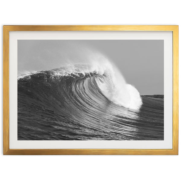 a black and white photo of a wave in the ocean