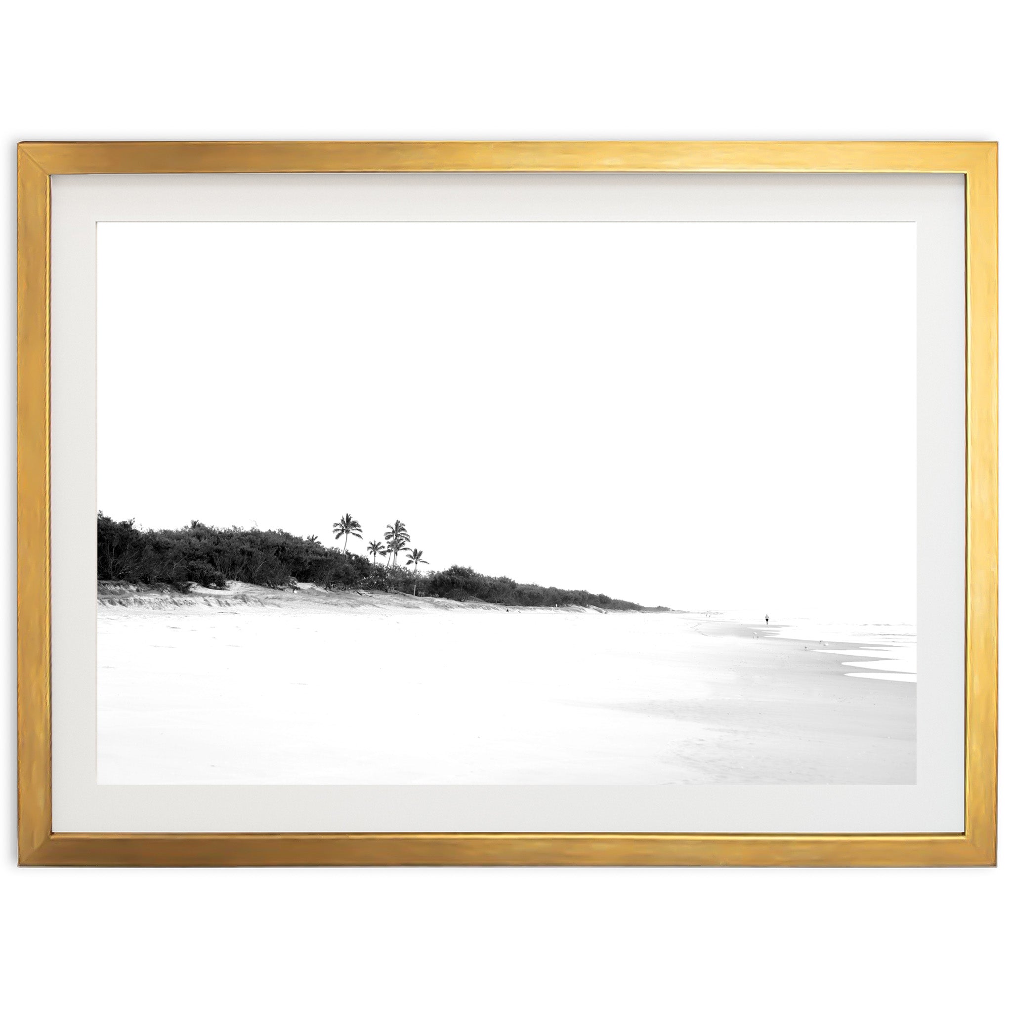 a black and white photo of a beach