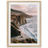 a picture of a beach with a cliff in the background