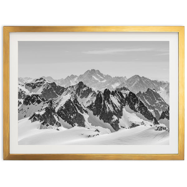 a black and white photo of a mountain range