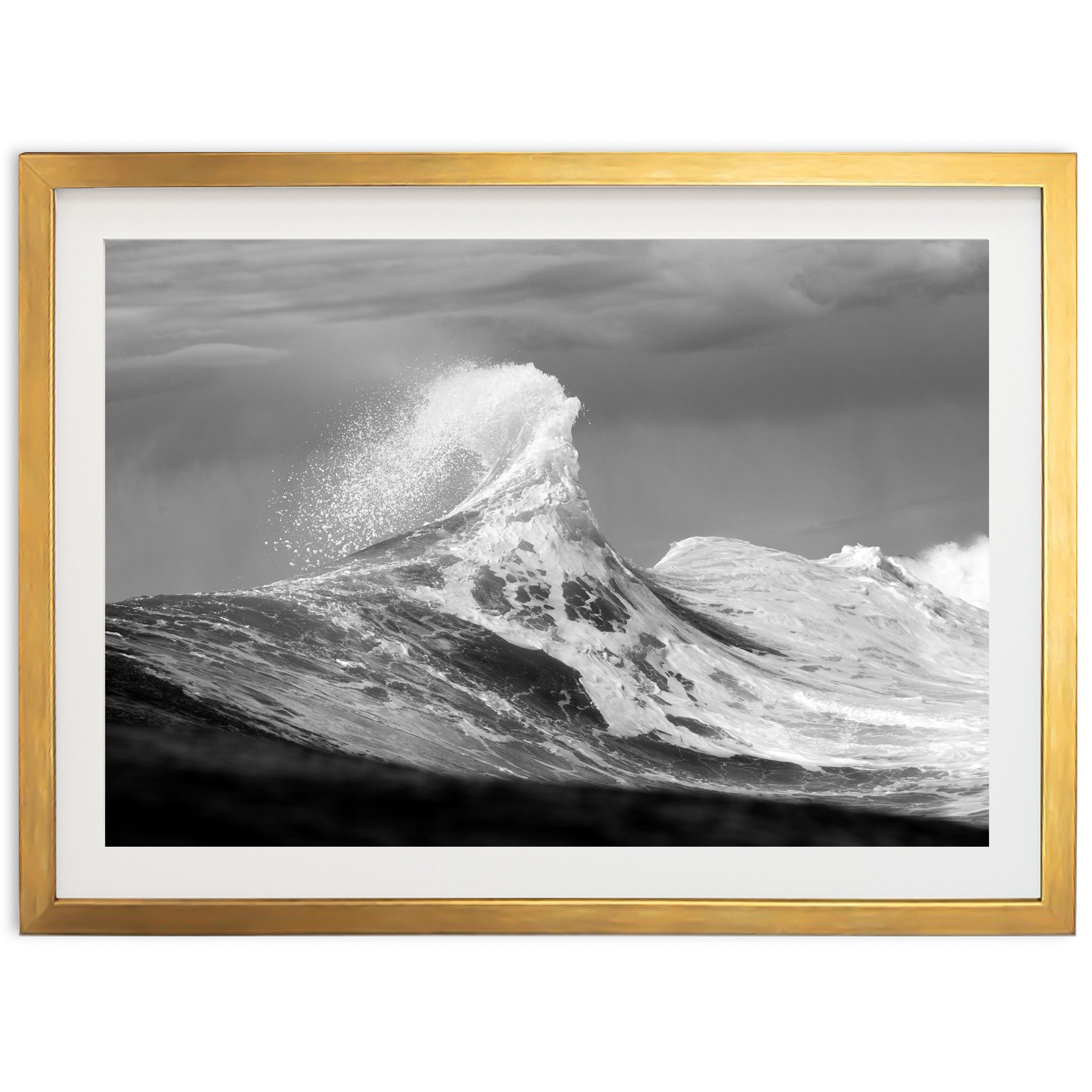 a black and white photo of a wave in the ocean