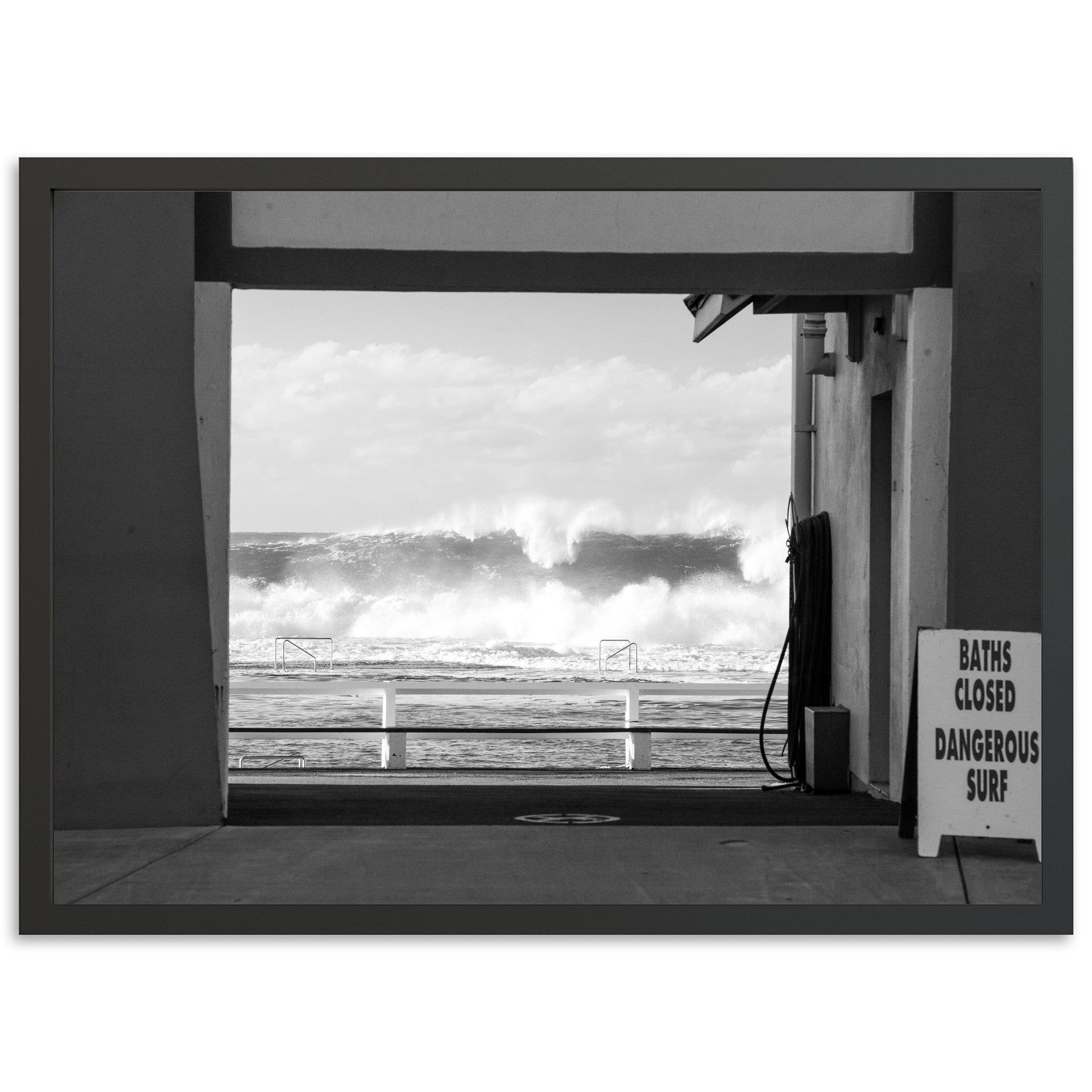 a black and white photo of a gas pump