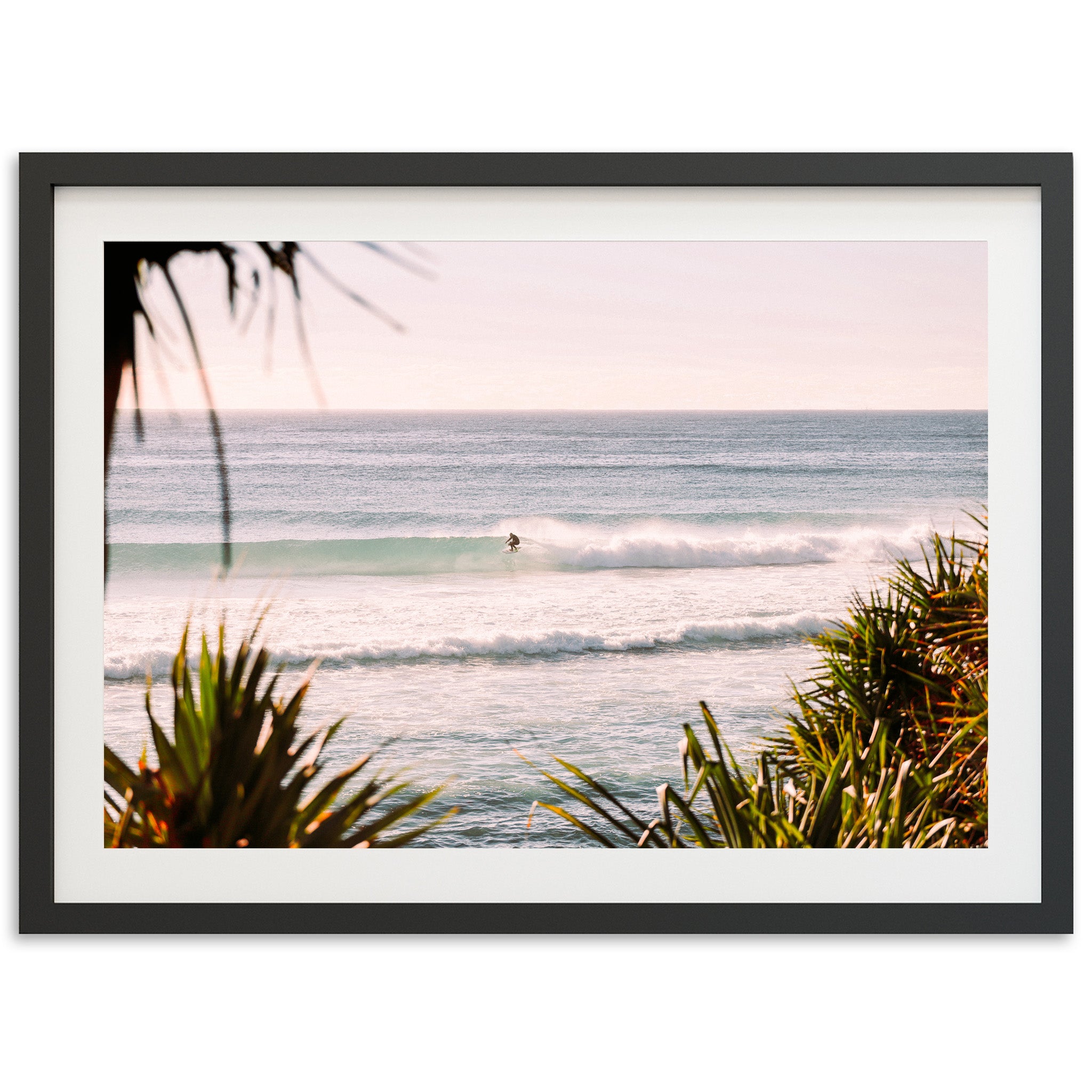 a picture of a surfer riding a wave in the ocean