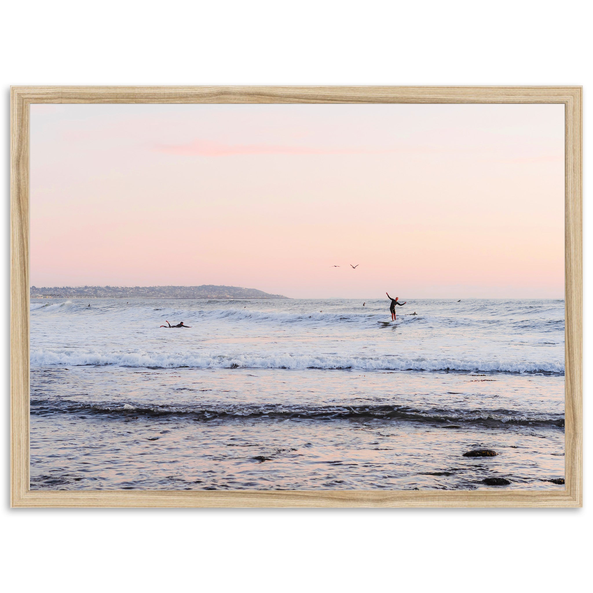 a person riding a surfboard on a wave in the ocean