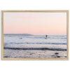 a person riding a surfboard on a wave in the ocean