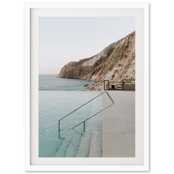 a picture of a pool with a view of the ocean