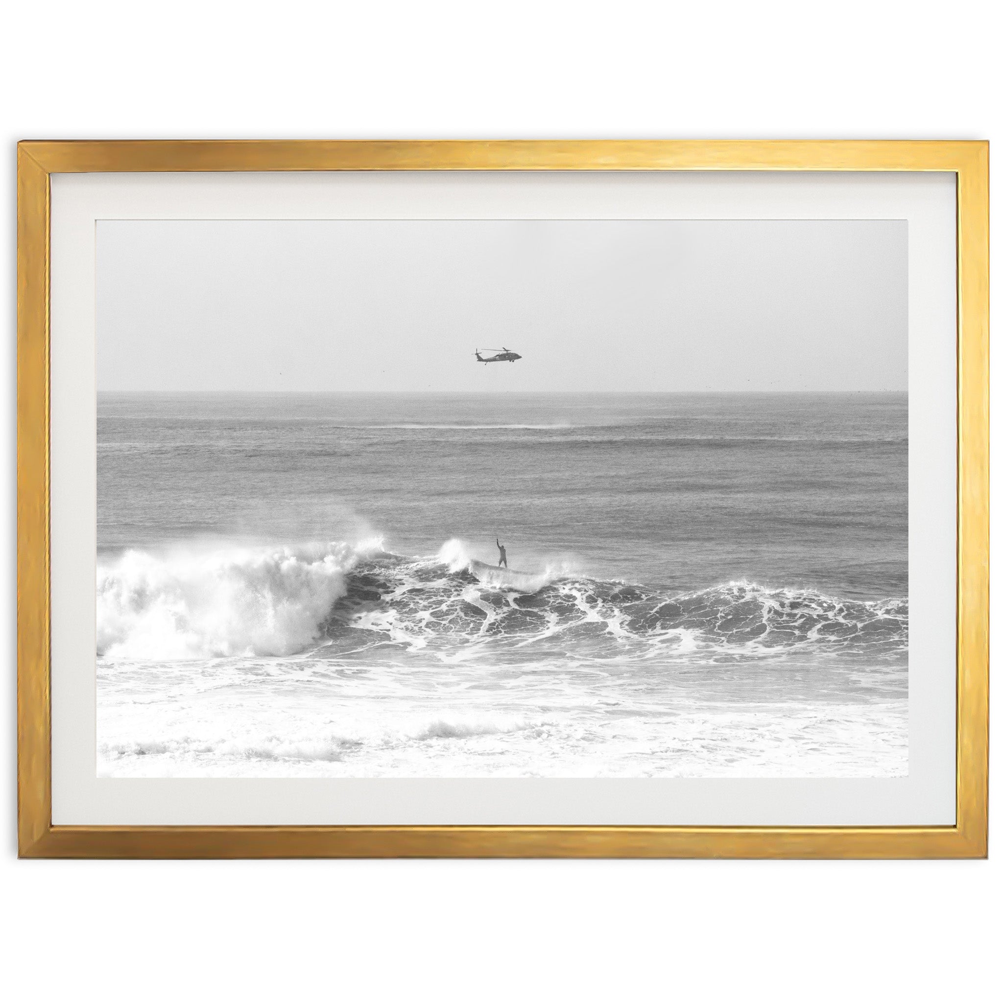 a black and white photo of a boat in the ocean