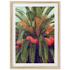 a picture of a palm tree with red flowers