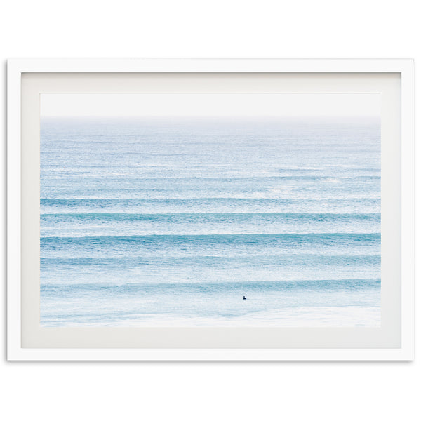 a picture of a blue ocean with a white frame