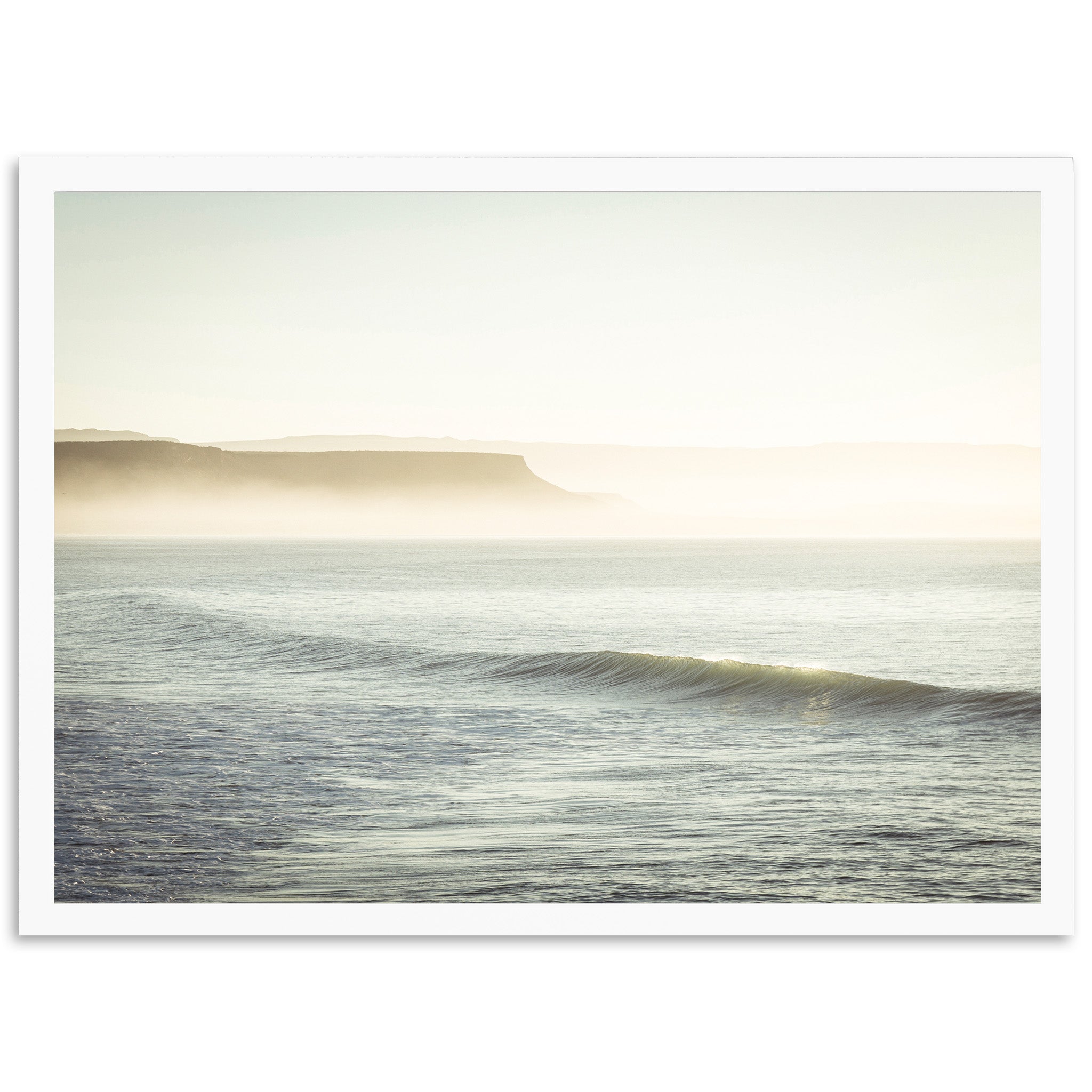 a person riding a surfboard on a wave in the ocean