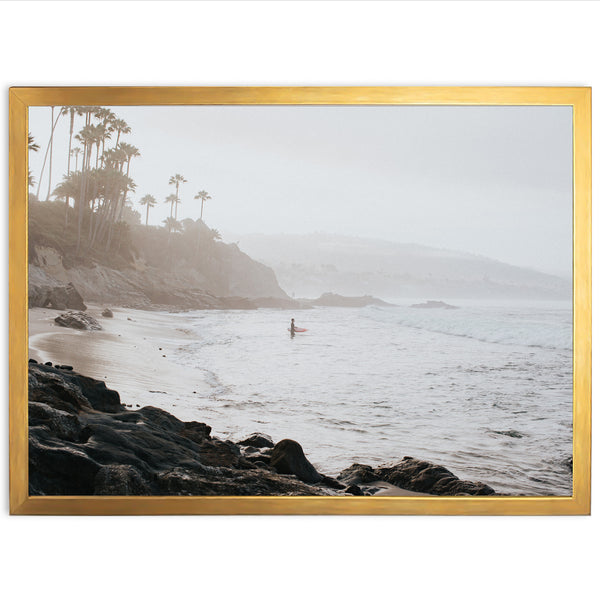 a picture of a person on a surfboard in the water