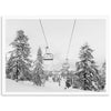 a black and white photo of a ski lift