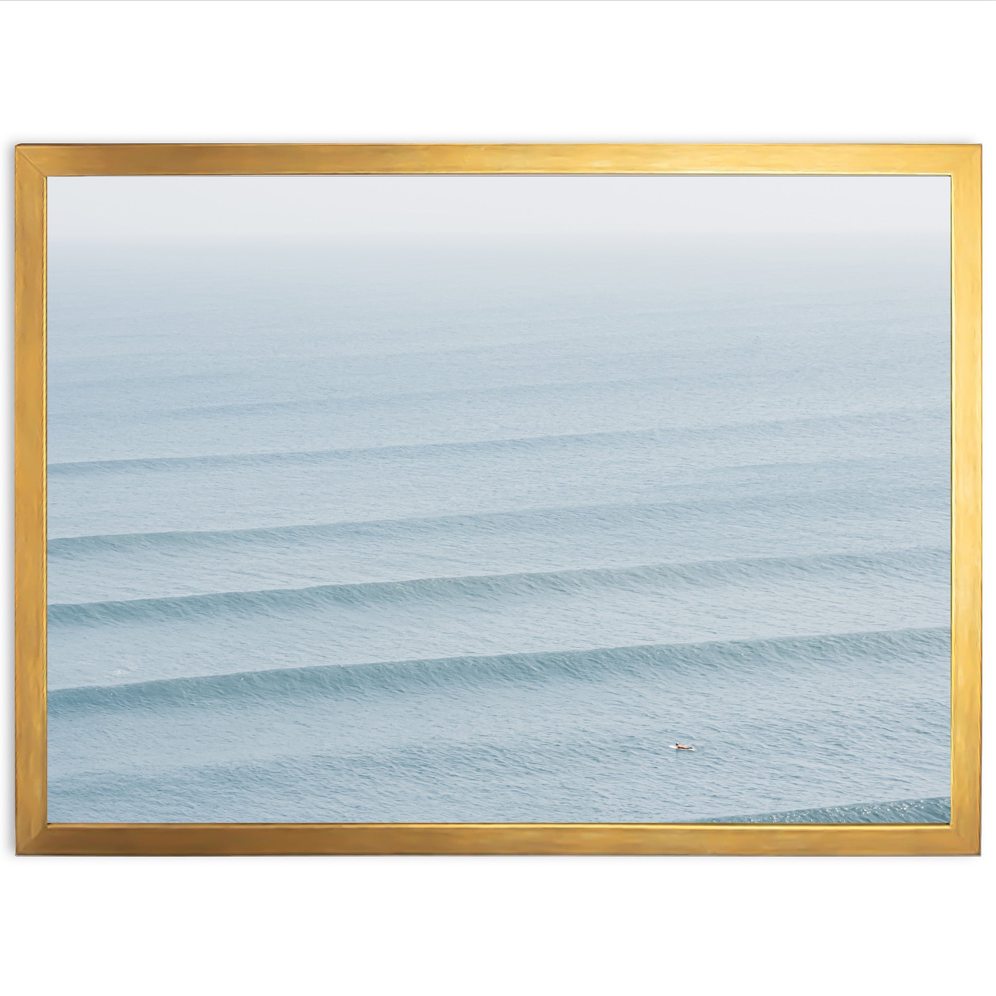 a picture frame with a picture of a wave in the ocean